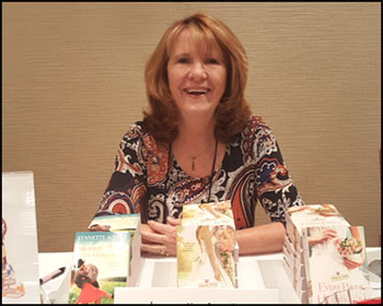 Author Lynnette Austin signing books